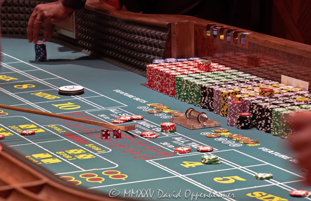 Craps Table at Wynn Las Vegas Casino Craps table at Wynn Las Vegas Resort and Casino in Las Vegas, Nevada - © 2025 David Oppenheimer - Performance Impressions casino photography archives - https://performanceimpressions.com craps, craps table, Wynn Casino, casino, Wynn craps table, dice, chips, casino chips, gaming, play, betting, odds, win, gambling, wager, bet, luck, gamble, 3355 S Las Vegas Blvd, 89109, Wynn, Encore, Encore Las Vegas, Encore Resort, Encore Casino, Encore Vegas, Encore at Wynn, Wynn Las Vegas, Wynn Vegas, Wynn Resort, Wynn Resorts, 3131 Las Vegas Blvd S, 89109, hotel, resort, building, architecture, shops, shopping, bridge, night, lights, city lights, WYNN, WYNN stock, five star, luxury, Las Vegas, Vegas, Las Vegas Strip, table game, dice game, casino floor, entertainment, luxury gaming, Nevada casino, vacation, escape, dream, art, fine art, artwork, painting, Nevada, Nevada photography, colorful, wall art, United States, horizontal, color, 1-14993092111