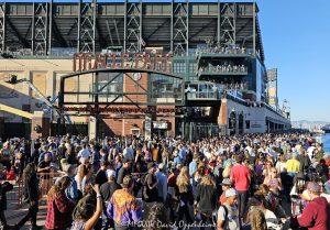 Deadheads at Dead & Company Final Tour at Oracle Park at the Lefty O'Doul Gate by Willie Mays Plaza in San Francisco, California - © 2024 David Oppenheimer - Performance Impressions photography archives - https://performanceimpressions.com Dead & Company, Dead & Company Final Tour, Final Tour, tour, Oracle Park, Grateful Dead, crowd, entrance, enter, stadium, San Francisco, people, fans, deadheads, packed, packed crowd, California, line, SoMA, building, architecture, baseball stadium, 24 Willie Mays Plz, Willie Mays Plaza, 94107, Populous, HOK Sport, HOK Sport Venue Event, outside, O’Doul Gate, Lefty O'Doul Gate, Third Street, gate, concert, concert photography, David Oppenheimer, 1-13985601741,