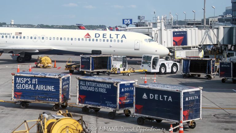 Delta Air Lines jets at Minneapolis–Saint Paul International Airport in Saint Paul, Minnesota aerial view - © 2024 David Oppenheimer - Performance Impressions aerial photography archives - https://performanceimpressions.com Delta, Delta Air Lines, DAL, DAL stock, jets, Minneapolis–Saint Paul International Airport, airport, terminal, MSP, MSP airport, Minnesota, travel, aircraft, airplanes, aviation, ground operations, logistic, air travel, jet set, jetset, planes, United States, color, horizontal, David Oppenheimer, 1-13985601741,