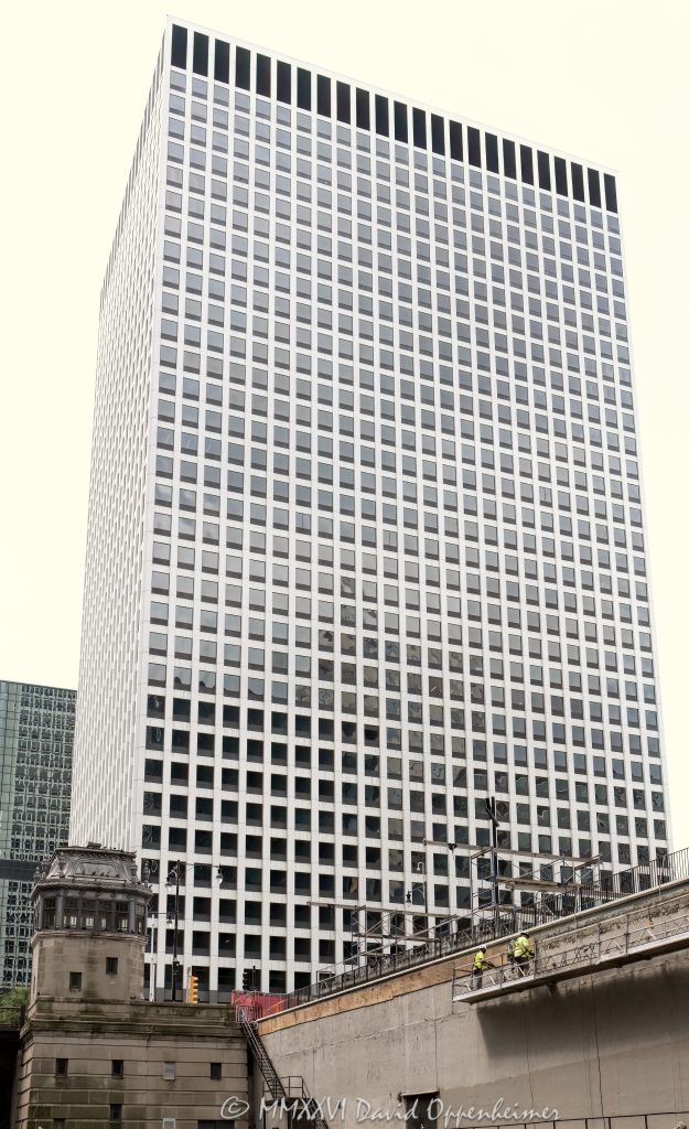 Fifth Third Center at 222 South Riverside Plaza in Chicago, Illinois, located along the Chicago River above Union Station in the Loop financial district. Modern commercial office architecture originally designed by Skidmore, Owings & Merrill, featuring a grid-like glass facade, dark window bands, and strong vertical office tower massing. The Class A office building is also known as Gateway Center III and includes a Fifth Third Bank branch at the South Riverside Plaza address – © 2026 David Oppenheimer – Performance Impressions photography archives https://performanceimpressions.com Fifth Third Center, Fifth Third Center Chicago, Fifth Third Bank, Fifth Third Bank Chicago, Fifth Third, Fifth Third Bancorp, 222 South Riverside, 222 South Riverside Plaza, 222 S Riverside, 222 S Riverside Plaza, South Riverside Plaza, Riverside Plaza, Gateway Center III, Gateway Center, Chicago, Chicago Illinois, Illinois, United States, 60606, Downtown Chicago, Chicago Loop, Loop, financial district, Chicago River, Chicago riverfront, Union Station, Chicago Union Station, architecture, Chicago architecture, architectural photography, facade, building exterior, exterior, modern architecture, commercial architecture, corporate architecture, office architecture, office tower, office building, commercial building, building, tower, high-rise, glass tower, glass building, glass facade, grid facade, grid pattern, window grid, dark windows, window bands, curtain wall, commercial real estate, corporate real estate, real estate, business district, downtown, urban, financial center, business center, Class A office building, Chicago office tower, downtown office tower, Skidmore Owings Merrill, SOM, Wright Heerema Architects, JLL, Fifth Third Bank branch, commercial photography, commercial imagery, image licensing, licensing, photography licensing, art, print, fine art, David Oppenheimer, vertical, 1-15156784411