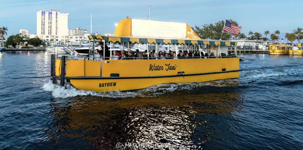 Fort Lauderdale Water Taxi on the Middle River of the Intracoastal Waterway in Florida - © 2024 David Oppenheimer - Performance Impressions photography archives - https://performanceimpressions.com Fort Lauderdale Water Taxi, Water Taxi, taxi, boat taxi, taxi boat, Bayview, Watertaxi, Fort Lauderdale taxi, City of Fort Lauderdale, transportation, travel, visit, tour, sightseeing, boat ride, boat, ferry, Middle River, Fort Lauderdale, Bahia Mar, Florida, waterfront, Intracoastal, Intracoastal Waterway, South Florida, Broward County, East Fort Lauderdale, palm trees, tropical, David Oppenheimer, color, horizontal, United States, VAu 1-530-124, 1-13553735171,