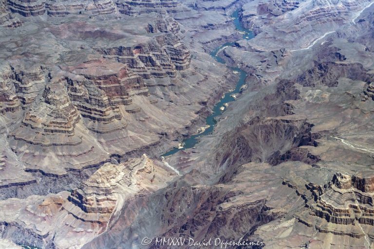 Grand Canyon aerial view of Diamond Canyon and Granite Spring Canyon with the Colorado River running through on the boundary of the Hualapai Indian Reservation in Mohave County, Arizona – © 2025 David Oppenheimer – Performance Impressions aerial photography archives – https://performanceimpressions.com Grand Canyon, Grand Canyon aerial, Grand Canyon aerial view, Grand Canyon aerial photography, Diamond Canyon, Granite Spring Canyon, Diamond Creek Beach, Diamond Creek, beach, riverfront, river, Diamond Creek Rapids, Diamond Peak, Peach Spring Canyon, Mile 464, Lower Granite Gorge, Two Hundred and Twenty mile, Granite Spring Rapids, canyon, Colorado River, Hualapai Indian Reservation, Hualapai, rocks, rocky, cliffs, canyon walls, sandstone cliffs, desert landscape, aerial, landscape, Arizona, Arizona aerial, wash, Grand Canyon geology, erosion, layered rock, valley, Grand Canyon National Park, canyon channel, national park, boundary, border, natural wonder, Mohave County, Mohave County aerial, Lake Mead National Recreation Area, Waterfall Rapids, waterfall, rapids, forbidden, forbidden zone, protected, habitat, ecology, trail, plateau, Sanup Plateau, Grand Wash Cliffs, desert, desert canyon, arid, rim, overlook, sedimentary, aerial photography, scenic view, horizontal, United States, color, 1-14993092111