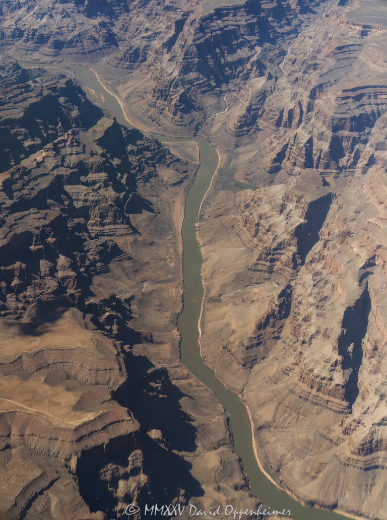 Grand Canyon aerial view of Lower Granite Gorge with Salt Creek flowing into the Colorado River at Devils Slide Rapids section along the boundary of the Hualapai Indian Reservation in Mohave County, Arizona – © 2025 David Oppenheimer – Performance Impressions aerial photography archives – https://performanceimpressions.com Grand Canyon, Grand Canyon aerial, Grand Canyon aerial view, Grand Canyon aerial photography, Lower Granite Gorge, Salt Creek, Last Chance Rapids, Devils Slide, Devils Slide Rapids, Devil’s Slide Rapids, Reference Point Creek, Reference Point, Horse Flat Canyon, beach, riverfront, river, canyon, Colorado River, Hualapai Indian Reservation, Hualapai, rocks, granite, rocky, cliffs, canyon walls, confluence, sandstone cliffs, desert landscape, aerial, landscape, Arizona, Arizona aerial, wash, Grand Canyon geology, erosion, layered rock, valley, Grand Canyon National Park, canyon channel, national park, boundary, border, natural wonder, schist, Precambrian, plateau, Golding Plateau, Mohave County, Mohave County aerial, Lake Mead National Recreation Area, Waterfall Rapids, waterfall, rapids, mesa, forbidden, forbidden zone, protected, habitat, ecology, trail, plateau, nature, desert, desert canyon, arid, rim, overlook, sedimentary, aerial photography, scenic view, vertical, United States, color, 1-14993092111