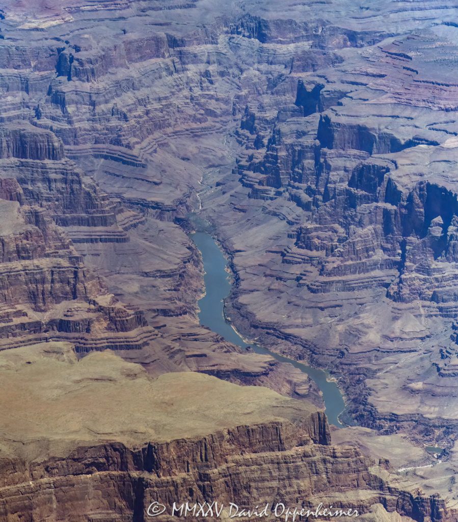 Grand Canyon Aerial View of Lower Granite Gorge Grand Canyon aerial view of Lower Granite Gorge near Horse Flat Canyon and the Last Chance Rapids section of the Colorado River along the boundary of the Hualapai Indian Reservation in Mohave County, Arizona – © 2025 David Oppenheimer – Performance Impressions aerial photography archives – https://performanceimpressions.com Grand Canyon, Grand Canyon aerial, Grand Canyon aerial view, Grand Canyon aerial photography, Lower Granite Gorge, Salt Creek, Last Chance Rapids, Devil’s Slide Rapids, Reference Point Creek, Reference Point, Horse Flat Canyon, beach, riverfront, river, canyon, Colorado River, Hualapai Indian Reservation, Hualapai, rocks, granite, rocky, cliffs, canyon walls, sandstone cliffs, desert landscape, aerial, landscape, Arizona, Arizona aerial, wash, Grand Canyon geology, erosion, layered rock, valley, Grand Canyon National Park, canyon channel, national park, boundary, border, natural wonder, schist, Precambrian, plateau, Golding Plateau, Mohave County, Mohave County aerial, Lake Mead National Recreation Area, Waterfall Rapids, waterfall, rapids, mesa, forbidden, forbidden zone, protected, habitat, ecology, trail, plateau, nature, desert, desert canyon, arid, rim, overlook, sedimentary, aerial photography, scenic view, vertical, United States, color, 1-14993092111