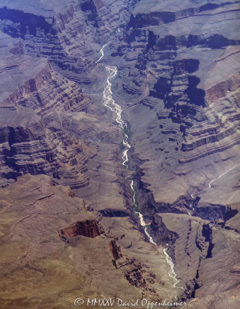 Grand Canyon Aerial View of Separation Canyon Grand Canyon aerial view of Separation Canyon in Lower Granite Gorge crossing the Colorado River on the boundary of the Hualapai Indian Reservation in Mohave County, Arizona – © 2025 David Oppenheimer – Performance Impressions aerial photography archives – https://performanceimpressions.com Grand Canyon, Grand Canyon aerial, Separation Canyon, Separation Canyon aerial, Grand Canyon aerial photography, beach, riverfront, river, Lower Granite Gorge, canyon, Colorado River, Hualapai Indian Reservation, Hualapai, rocks, rocky, cliffs, canyon walls, sandstone cliffs, desert landscape, aerial, landscape, Arizona, Arizona aerial, wash, geology, Grand Canyon geology, erosion, layered rock, valley, Grand Canyon National Park, canyon channel, national park, boundary, border, natural wonder, Separation Rapids, Littlefield, West Fork, Mohave County, Mohave County aerial, Lake Mead National Recreation Area, waterfall, rapids, forbidden, forbidden zone, protected, habitat, ecology, trail, plateau, Sanup Plateau, Grand Wash, desert, desert canyon, arid, rim, overlook, sedimentary, aerial photography, scenic view, vertical, United States, color, 1-14993092111