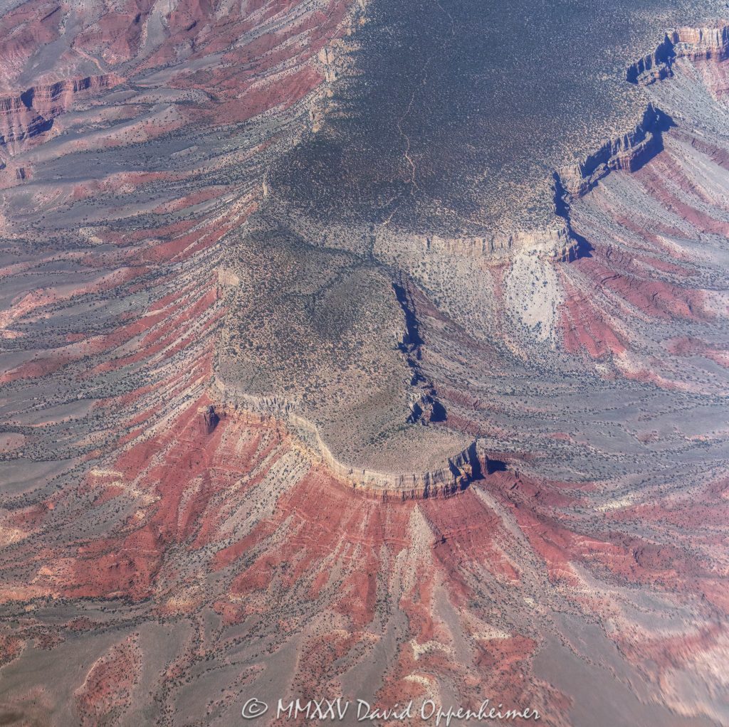 Grand Canyon National Park Aerial View of Twin Point Overlook on the Shivwits Plateau Grand Canyon National Park aerial view of Twin Point Overlook on the Shivwits Plateau in Mohave County, Arizona - © 2025 David Oppenheimer - Performance Impressions aerial photography archives - https://performanceimpressions.com Grand Canyon, Grand Canyon aerial, Twin Point Overlook, Twin Point Overlook aerial, Twin Point, Twin Point Aerial, Shivwits Plateau, Shivwits Plateau aerial, Sanup Plateau, plateau, plateau aerial, Red Rock Spring, Burnt Canyon, Surprise Canyon, Surprise Canyon Formation, conglomerate, Mississippian, Pennsylvanian, siltstone, channel fill, sinks, channel, ravines, Supai Group, Grand Canyon National Park, Grand Canyon National Park aerial, Arizona, Arizona aerial, ravine, Mohave County, Mohave County aerial, valley, valley aerial, aerial, aerial view, Hualapai, Hualapai reservation, mountains, arid, barren, Colorado River, canyon, valley, Hualapai Indian Reservation, vacation, gorge, rim, North Rim, view point, Littlefield, Littlefield aerial, Littlefield Arizona, 86432, red, red rocks, cliffs, bottom, lower, aerial photographer, limestone, Redwall Limestone, middle, wash, erosion, geology, rocks, erode, scenic, landscape, Lake Mead National Recreation Area, overlook, sandstone, rocky, canyon walls, visit, travel, American West, native lands, desert, high desert, advertising, United States, USA, America, national park, Grand Canyon Village, vertical, 1-14993092111