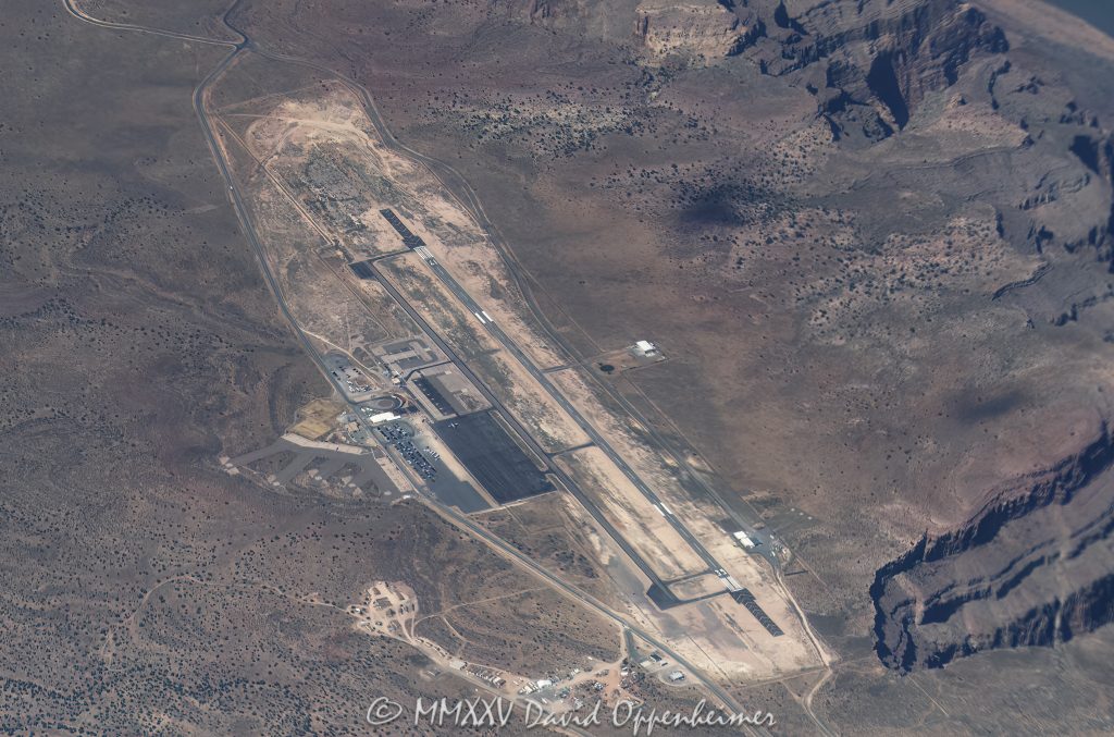 Grand Canyon West Airport Aerial View Grand Canyon West Airport aerial view - © 2025 David Oppenheimer - Performance Impressions aerial aviation photography archives - https://performanceimpressions.com Grand Canyon West Airport, Grand Canyon West Airport aerial, Grand Canyon, Grand Canyon aerial, Grand Canyon airport, Grand Canyon West, Grand Canyon Village, 86434, GCQ, 1G4, Grand Canyon National Park, Grand Canyon National Park aerial, Colorado River, fly, Hualapai, Hualapai reservation, plateau, rocky, rocks, gorge, cavern, sandstone, overlook, mountains, arid, barren, canyon, valley, Hualapai Indian Reservation, summer, aerial, photo, trip, travel, runway, heliport, airport, vacation, Mohave County, rim, South Rim, North Rim, view point, cliffs, landing strip, helicopter, Supai Group, Mississippian, Pennsylvanian, aerial photographer, aerial view, erosion, geology, Arizona, Arizona aerial, scenic, landscape, Lake Mead National Recreation Area, visit, United States, USA, America, Lower Granite Gorge, national park, tour, marketing, advertising, licensing, American West, high desert, native lands, horizontal, color, 1-14993092111