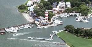 Harbour Town Lighthouse at 149 Lighthouse Road on Hilton Head Island, South Carolina, aerial view © 2024 David Oppenheimer - Performance Impressions aerial photography archives - https://performanceimpressions.com Harbour Town Lighthouse, Harbour Town Lighthouse aerial, lighthouse, Harbour Town, Liberty Oak, Liberty Oak park, park, marina, Harbour Town Marina, Harbour Town Marina aerial, lighthouse, museum, history, Harbour Town aerial, Harbour Town aerial view, Pirates of Hilton Head, Harbour Town Pier, pier, 149 Lighthouse Road, Haig Point Water Taxi, docks, water taxi, memorial park, coast, Harbour Town Yacht Basin, Harbour Town Yacht Club, harbor, yachts, boats, yacht club, Schooner Court Villas, Harbour Town Golf Links, golf, golf course, Vagabond Cruise, sightseeing, shopping, retail, Sea Pines Resort, sea pines, resort, Harbour Town Golf Links, golf, golf course, vacation, Hilton Head, Hilton Head Island, Town of Hilton Head, 29928, South Carolina, Lowcountry, Hilton head island real estate, Hilton Head real estate, real estate, aerial photographer, aerial photography, aerial view, aerial, building, architecture, David Oppenheimer, David Gordon Oppenheimer, United States, color, horizontal, 1-13726821381,