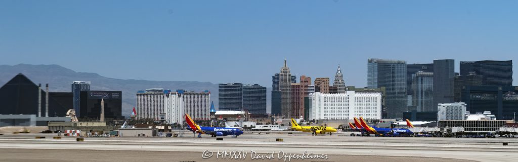 Harry Reid International Airport and the Las Vegas Strip Skyline in Las Vegas, Nevada Harry Reid International Airport and the Las Vegas Strip skyline in Las Vegas, Nevada - © 2025 David Oppenheimer - Performance Impressions aviation photography archives - https://performanceimpressions.com Harry Reid International Airport, Las Vegas Strip, Las Vegas, Las Vegas skyline, skyline, Vegas Airport, Las Vegas Airport, McCarran International Airport, airport, LAS, KLAS, runway, terminal, planes, jets, aviation, travel, Nevada, daytime, visit, transportation, flight, tarmac, air travel, Clark County, Southwest, Southwest Airlines, Spirit, Spirit Airlines, hotels, casinos, resorts, Paradise, Aviation Museum, airplanes, aircraft, luxury, real estate, 5757 Wayne Newton Blvd, NV, 89119, cityscape, vacation, landscape, America, United States, USA, aviation photographer, aviation photography, horizontal, color, 1-14993092111
