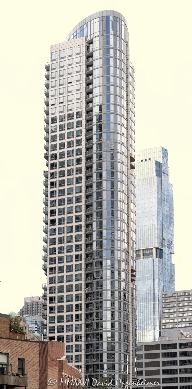 Hubbard Place apartment tower at 360 West Hubbard Street in Chicago, Illinois, located in the River North neighborhood near Kingsbury Street and East Bank Club. Contemporary residential high-rise architecture designed by Solomon Cordwell Buenz featuring a glass facade, balconies, and luxury rental residences. The 43-story apartment building was developed by The Habitat Company and opened in 2013 – © 2026 David Oppenheimer – Performance Impressions photography archives https://performanceimpressions.com Hubbard Place, Hubbard Place Chicago, Hubbard Place Apartments, Hubbard Place apartment tower, 360 West Hubbard, 360 West Hubbard Street, 360 W Hubbard, West Hubbard Street, Hubbard Street, River North, Chicago, Chicago Illinois, Illinois, United States, 60654, Downtown Chicago, Chicago Loop, Near North Side, Kingsbury Street, East Bank Club, architecture, Chicago architecture, architectural photography, facade, building exterior, exterior, residential architecture, modern architecture, contemporary architecture, urban architecture, apartment tower, apartment building, rental apartments, luxury apartments, residential tower, residential building, high-rise, skyscraper, building, tower, glass tower, glass building, glass facade, reflective glass, curtain wall, balconies, balcony, residential real estate, apartment real estate, Chicago real estate, real estate, downtown apartments, River North apartments, Chicago apartments, luxury rentals, urban living, city living, commercial architecture, downtown, urban, iconic building, American architecture, Illinois architecture, daylight, multifamily housing, Solomon Cordwell Buenz, SCB, The Habitat Company, Habitat Company, McHugh Construction, Greystar, commercial photography, commercial imagery, image licensing, licensing, photography licensing, art, print, fine art, David Oppenheimer, vertical, 1-15156784411