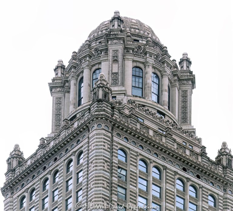 Jewelers Building at 35 East Wacker Drive in Chicago, Illinois, showing the ornate terra cotta exterior, upper tower, and historic skyscraper architecture in the Loop. Also known as 35 East Wacker, the building was formerly the Pure Oil Building and North American Life Building – © 2026 David Oppenheimer – Performance Impressions photography archives https://performanceimpressions.com Jewelers Building, 35 East Wacker, 35 East Wacker Drive, 35 E Wacker Dr, Jewelers Building Chicago, 35 East Wacker Chicago, Pure Oil Building, North American Life Building, North American Life Insurance Building, Chicago Loop, Loop Chicago, East Wacker Drive, Wacker Drive, Chicago architecture, Chicago skyscraper, historic skyscraper, terra cotta, ornate exterior, upper tower, building exterior, exterior, facade, historic architecture, classical revival architecture, neoclassical architecture, Chicago Landmark, downtown Chicago, Cook County, Illinois, Joachim Giaver, Frederick P Dinkelberg, Thielbar and Fugard, high rise, office building, commercial building, architecture, building, skyscraper, landmark, urban architecture, city architecture, architectural detail, windows, decorative masonry, ornamental detail, stonework, vertical architecture, Midwest, United States, 60601, Licensing, image licensing, commercial imagery, photography licensing, art, print, fine art, commercial photography, David Oppenheimer, vertical, 1-15156784411