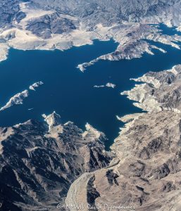 Lake Mead on the Arizona and Nevada border showing Indian Canyon Cove, Sandy Cove, Hamblin Bay, and Auxiliary Point in Lake Mead National Recreation Area aerial view - © 2025 David Oppenheimer - Performance Impressions aerial photography archives - https://performanceimpressions.com Lake Mead, Arizona, Nevada, border, Indian Canyon Cove, Sandy Cove, Hamblin Bay, Auxiliary Point, Lake Mead National Recreation Area, Indian Canyon, Beacon Rock, Boulder Basin, Boulder Canyon, aerial, desert, lake, Clark County, boating, boats, docks, aerial photographer, aerial photography, United States, vertical, color, 1-14977862771