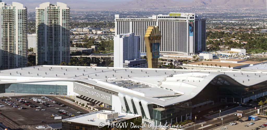 Las Vegas Convention Center Aerial View Las Vegas Convention Center at 3150 Paradise Rd in Paradise, Nevada aerial view - © 2025 David Oppenheimer - Performance Impressions aerial photography archives - https://performanceimpressions.com Las Vegas Convention Center, LVCC, 3150 Paradise Rd, Paradise, Nevada, convention center, building, façade, trade shows, trade show, expo, expos, exhibitions, conference, conference center, corporate events, business, networking event, networking, seminar, seminars, workshop, trade fair, event, event space, Westgate Las Vegas, Turnberry Place, Two Turnberry Place, One Turnberry Place, Westgate, Sands Expo, Venetian Expo, entrance, architecture, facility, conventions, convention, tourism, SpringHill Suites by Marriott Las Vegas Convention Center, SpringHill Suites, Marriott, Las Vegas Convention and Visitors Authority, LVCVA, Westgate Las Vegas Resort & Casino, roof, United States, USA, horizontal, color, 1-14993092111