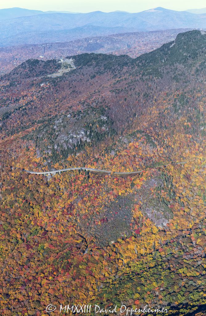 Linn Cove Viaduct on the Blue Ridge Parkway below Grandfather Mountain State Park with Autumn Colors in Western North Carolina Aerial View