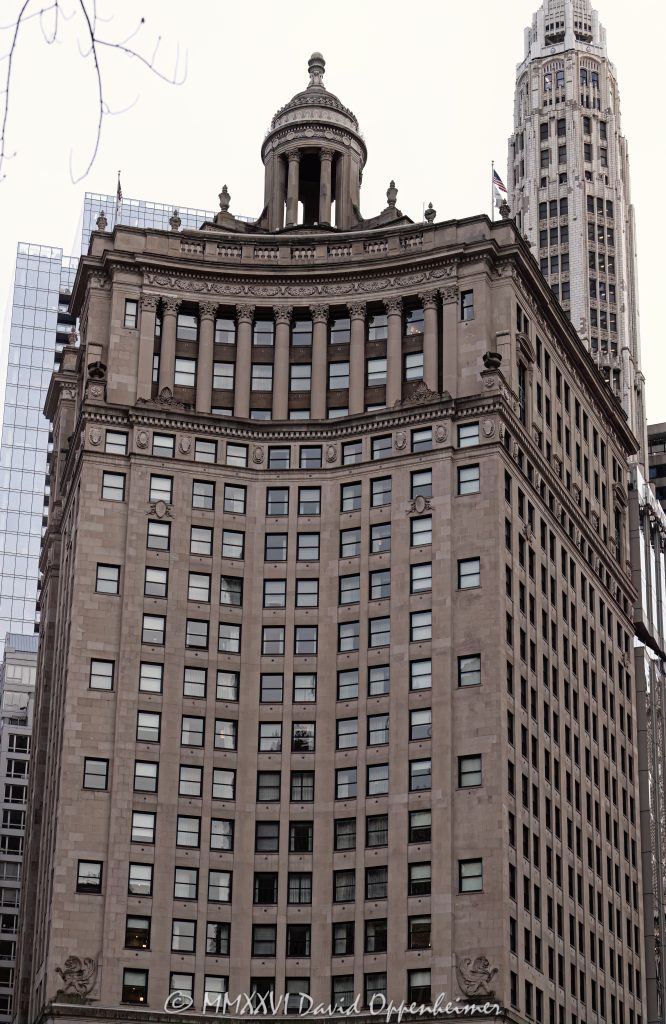 LondonHouse Chicago, Curio Collection by Hilton, at 85 East Wacker Drive occupies the restored London Guarantee Building beside the Chicago River. Alfred S. Alschuler’s Beaux-Arts tower pairs an Indiana limestone facade, Corinthian colonnades and a domed cupola with a modern glass addition by Goettsch Partners, creating a distinctive luxury hotel at Michigan Avenue and Wacker Drive in Chicago, Illinois – © 2026 David Oppenheimer – Performance Impressions photography archives https://performanceimpressions.com LondonHouse Chicago Curio Collection by Hilton, LondonHouse Chicago, LondonHouse, LondonHouse Hotel, London House Chicago, London House Hotel, Curio Collection by Hilton, Curio Collection, Hilton, Hilton Honors, Hilton Worldwide Holdings, 85 East Wacker Drive, 85 E Wacker Drive, 85 E Wacker Dr, 360 North Michigan Avenue, 360 N Michigan Avenue, 360 N Michigan Ave, London Guarantee Building, London Guarantee & Accident Building, London Guarantee and Accident Building, London Guaranty & Accident Building, Stone Container Building, Crain Communications Building, London House jazz club, London House, East Wacker Drive, Wacker Drive, North Michigan Avenue, Michigan Avenue, Chicago River, Chicago Riverwalk, Riverwalk, riverfront, waterfront, Magnificent Mile, DuSable Bridge, Michigan Avenue Bridge, Michigan Wacker Historic District, Chicago Loop, Loop Chicago, downtown Chicago, Chicago, Chicago Illinois, Chicago IL, Illinois, 60601, facade, building exterior, exterior, hotel facade, limestone facade, Indiana limestone, stone facade, Beaux-Arts, Beaux-Arts architecture, classical architecture, Corinthian columns, colonnade, cupola, domed cupola, dome, historic facade, ornate facade, glass addition, glass tower, modern addition, adaptive reuse, hotel conversion, historic hotel, luxury hotel, boutique hotel, downtown hotel, Chicago hotel, riverfront hotel, Michigan Avenue hotel, hotel, hospitality, travel, tourism, rooftop bar, LH Rooftop, LondonHouse rooftop, building, tower, high rise, skyscraper, landmark building, historic building, Chicago Landmark, Fort Dearborn, jazz history, jazz club, WLS Radio, Paul Harvey, architecture, architectural photography, Chicago architecture, hotel architecture, historic architecture, commercial architecture, Alfred S Alschuler, Alfred Alschuler, Goettsch Partners, Oxford Capital Group, Oxford Hotels & Resorts, London Guarantee and Accident Company, real estate, Chicago real estate, hotel real estate, commercial real estate, riverfront real estate, Illinois architecture, United States, licensing, image licensing, commercial imagery, photography licensing, art, print, fine art, commercial photography, David Oppenheimer, vertical, 1-15213827141