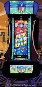 NFL Slots Super Bowl Jackpots slot machine at The Venetian Casino by Aristocrat Technologies in Las Vegas, Nevada - © 2025 David Oppenheimer - Performance Impressions casino photography archives - https://performanceimpressions.com NFL Slots, NFL, Pick Your Team, National Football League, slot machine, Aristocrat Technologies, Aristocrat Gaming, Super Bowl Jackpots, Super Bowl, The Venetian, gaming, casino, Las Vegas, Nevada, slots, odds, win, gambling, wager, bet, luck, jackpot, gamble, quick spin, resort, American Gaming Association, Aristocrat Leisure Limited, ALL, AGA, 3355 S Las Vegas Blvd, 89109, bright, lights, colorful, United States, vertical, color, 1-14977862771