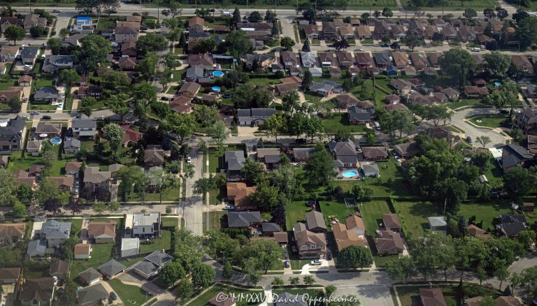 Norridge Illinois residential neighborhood aerial photo, showing single-family homes, rooftops, tree-lined streets, mowed lawns, and well-maintained yards in the Chicago area suburb of Cook County. The village of Norridge sits just northwest of Chicago and is locally known as the Island Within a City – © 2026 David Oppenheimer – Performance Impressions aerial photography archives https://performanceimpressions.com Norridge Illinois aerial photo, Norridge IL aerial photo, Norridge neighborhood aerial, Norridge Illinois neighborhood, Norridge real estate, Norridge homes aerial, Norridge residential neighborhood, Norridge single family homes, Norridge rooftops, Norridge yards, Norridge lawns, Norridge houses, Norridge Illinois, Norridge IL, 60706, Chicago area homes, Chicago area residential, Chicago area suburb, Chicago suburbs, Chicagoland, Cook County Illinois, Cook County homes, northwest Chicago suburbs, near Chicago, Island Within a City, residential neighborhood, single family homes, single-family homes, homes, houses, rooftops, roofs, yards, lawns, mowed lawns, maintained yards, well maintained neighborhood, suburban neighborhood, suburb, suburban homes, residential streets, tree-lined streets, neighborhood blocks, residential blocks, aerial, aerial photo, aerial photography, aerial photographer, aerial view, aerial image, neighborhood aerial, residential aerial, suburban aerial, real estate aerial, real estate, housing, residential, community, peaceful neighborhood, Illinois homes, Illinois residential, Illinois suburb, United States, Licensing, image licensing, commercial imagery, photography licensing, art, print, fine art, commercial photography, David Oppenheimer, horizontal, 1-15156784411