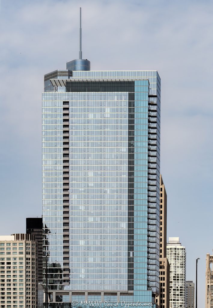 Loews Chicago Hotel at 455 North Park Drive rises in Chicago’s Streeterville neighborhood near the Chicago River, with a contemporary glass-and-steel facade shared by the Loews Hotels downtown property and North Water Apartments. Designed by Solomon Cordwell Buenz and developed by DRW Holdings with The John Buck Company, the mixed-use tower is also known as Loews Hotel Tower and Loews North Park Drive – © 2026 David Oppenheimer – Performance Impressions photography archives https://performanceimpressions.com Loews Chicago Hotel 455 N Park Dr, Loews Chicago Hotel, 455 North Park Drive, 455 N Park Dr, 455 N Park Drive, Loews Chicago Hotel Chicago, Loews Chicago Downtown Hotel, Loews Hotels Chicago, Loews Hotel Tower, Loews North Park Drive, North Water Apartments, North Water, 340 E North Water Street, 340 E North Water St, North Water Apartments Chicago, North Water Street apartments, Streeterville, Streeterville Chicago, downtown Chicago, Chicago Illinois, Chicago IL, Near North Side, North Park Drive, East North Water Street, Chicago River, Navy Pier, Magnificent Mile, Lake Michigan, 60611, facade, building exterior, exterior, hotel facade, apartment tower, glass facade, glass and steel, high rise, tower, hotel tower, mixed use tower, hotel and apartment tower, hotel, luxury hotel, downtown hotel, Chicago hotel, apartments, rental apartments, residential tower, hospitality, travel, tourism, architecture, architectural photography, Chicago architecture, contemporary architecture, commercial architecture, Solomon Cordwell Buenz, SCB, DRW Holdings, DRW Trading Group, The John Buck Company, Magnusson Klemencic Associates, Lendlease, Loews Hotels, Loews Hotels & Co, Loews Corporation, luxury hospitality, hotel brand, Chicago skyline, Illinois architecture, United States, Licensing, image licensing, commercial imagery, photography licensing, art, print, fine art, commercial photography, David Oppenheimer, horizontal, 1-15156784411