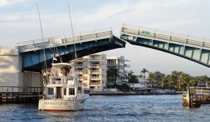 Oakland Park Boulevard Bridge drawbridge opening with the yacht Hooked Up III on the Intracoastal Waterway in Fort Lauderdale, Florida - © 2024 David Oppenheimer - Performance Impressions photography archives - https://performanceimpressions.com Oakland Park Boulevard Bridge, Oakland Bridge, drawbridge, bridge, Intracoastal, Intracoastal Waterway, Lauderdale Beach, Galt Mile, Coral Ridge, East Oakland, East Oakland Park Boulevard, double-leaf bascule, Fort Lauderdale, yachting, yacht, Hooked Up, Hooked Up III, boat, travel, vacation, fishing, fishing boat, deep sea fishing, opening, open, draw bridge, Ocean Alexander 90, Alexander 90, Ocean Alexander, isles, river, architecture, real estate, Fort Lauderdale real estate, property, Florida, 33308, engineering, logistics, waterway, waterfront, neighborhood, South Florida, Broward County, resort-style, sunset, palm trees, tropical, seawall, David Oppenheimer, color, horizontal, United States, VAu 1-530-124, 1-13553735171,