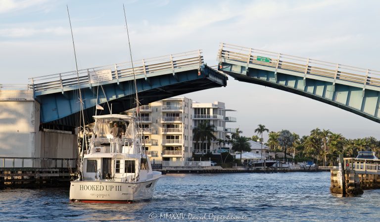 Oakland Park Boulevard Bridge drawbridge opening with the yacht Hooked Up III on the Intracoastal Waterway in Fort Lauderdale, Florida - © 2024 David Oppenheimer - Performance Impressions photography archives - https://performanceimpressions.com Oakland Park Boulevard Bridge, Oakland Bridge, drawbridge, bridge, Intracoastal, Intracoastal Waterway, Lauderdale Beach, Galt Mile, Coral Ridge, East Oakland, East Oakland Park Boulevard, double-leaf bascule, Fort Lauderdale, yachting, yacht, Hooked Up, Hooked Up III, boat, travel, vacation, fishing, fishing boat, deep sea fishing, opening, open, draw bridge, Ocean Alexander 90, Alexander 90, Ocean Alexander, isles, river, architecture, real estate, Fort Lauderdale real estate, property, Florida, 33308, engineering, logistics, waterway, waterfront, neighborhood, South Florida, Broward County, resort-style, sunset, palm trees, tropical, seawall, David Oppenheimer, color, horizontal, United States, VAu 1-530-124, 1-13553735171,