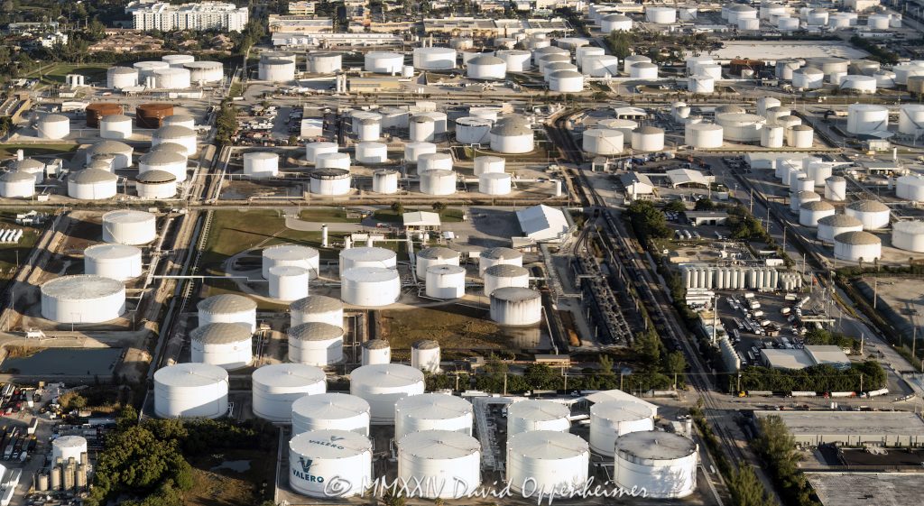 ExxonMobil, Chevron, Eagle Transport Port Everglades, and tank field at 2851 SE 14th Ave in Fort Lauderdale, Florida aerial view - © 2024 David Oppenheimer - Performance Impressions aerial photography archives - https://performanceimpressions.com Eagle Transport Port Everglades, tank field, 2851 SE 14th Ave, Eagle Transport, Port Everglades, Port Everglades aerial, 33316, port, Dania Beach, Lake Mabel, Harbordale, Broward County Convention Center, Exxon Mobil, ExxonMobil, ExxonMobil Port Everglades, Port Everglades Terminal, ExxonMobil Port Everglades Terminal, 1150 Spangler Blvd, South Florida, Chevron Products Terminal, 1400 SE 24th St, Chevron, CVX, CVX stock, XOM, XOM stock, Florida, liquid terminal, liquid storage, deep-sea, pipelines, maritime, aerial, aerial view, energy, power, tank field, oil, fuel, gasoline, storage, electricity, carbon fuel, carbon, carbon emissions, emissions, greenhouse gasses, logistics, infrastructure, energy market, market, Department of Energy, port, terminal, distribution, liquid storage, pipeline, energy investors, aerial photographer, aerial photography, fossil fuels, CO2, environment, horizontal, color, United States, David Oppenheimer, VAu 1-530-124, 1-13553735171,