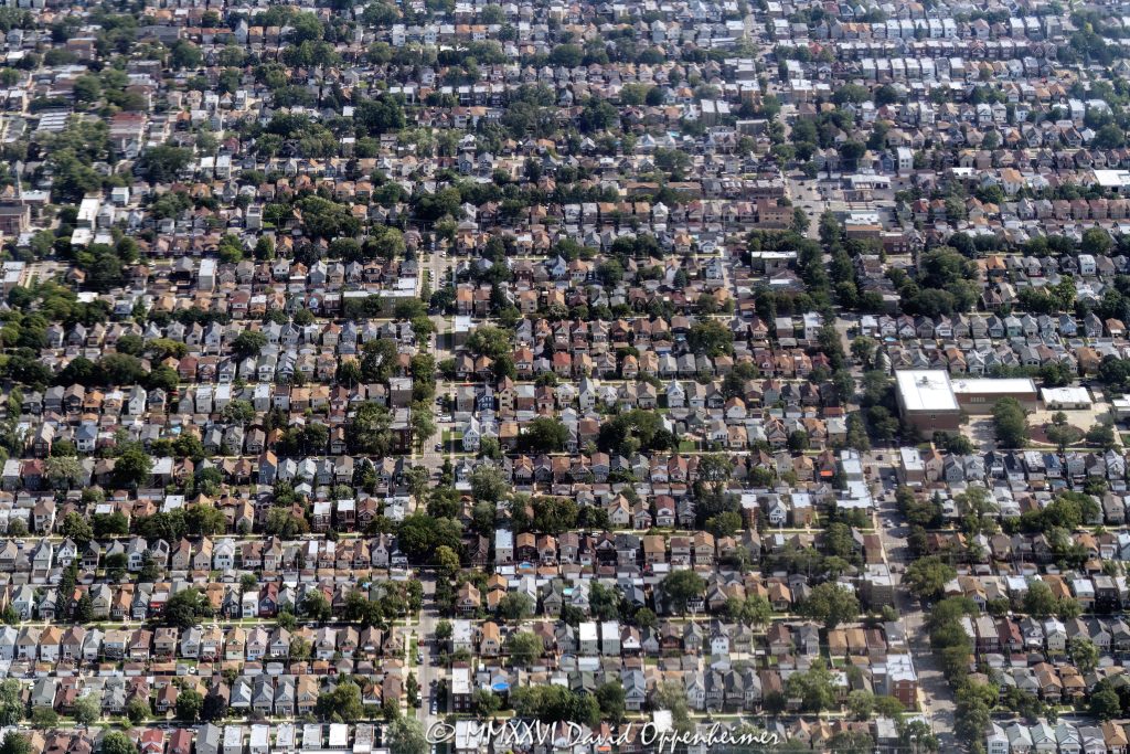 Portage Park neighborhood aerial photo in Chicago showing a dense residential street grid of houses, yards, rooftops, alleys, and tree-lined blocks on the Northwest Side. The view emphasizes residential real estate, housing patterns, and the orderly urban layout of the Portage Park community area – © 2026 David Oppenheimer – Performance Impressions aerial photography archives https://performanceimpressions.com Portage Park aerial, Portage Park Chicago, Portage Park neighborhood, Portage Park houses, Portage Park homes, Portage Park real estate, Chicago aerial, Chicago neighborhood, Chicago houses, Chicago homes, Chicago real estate, Northwest Side Chicago, Northwest Side, residential aerial, neighborhood aerial, real estate aerial, housing aerial, aerial photo, aerial photography, aerial view, aerial image, aerial photographer, summer aerial, urban aerial, residential, residential neighborhood, residential blocks, street grid, city grid, grid layout, city blocks, block pattern, houses, homes, rooftops, yards, backyards, alleys, streets, tree lined streets, single family homes, single family houses, townhomes, townhouses, row houses, two flats, bungalows, Chicago bungalow, residential housing, housing, real estate, residential real estate, neighborhood real estate, urban real estate, property, residential property, land use, urban planning, neighborhood planning, community area, Chicago neighborhoods, urban landscape, residential development, William P Gray Elementary, William P. Gray Elementary, Gray Elementary School, 3730 N Laramie Ave, Laramie Avenue, Chicago Public Schools, CPS, Chicago school, elementary school, Chicago Illinois, Chicago IL, 60641, United States, licensing, image licensing, commercial imagery, photography licensing, art, print, fine art, commercial photography, David Oppenheimer, horizontal, 1-15156784411