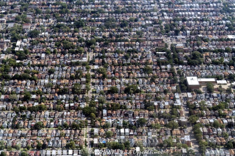 Portage Park neighborhood aerial photo in Chicago showing a dense residential street grid of houses, yards, rooftops, alleys, and tree-lined blocks on the Northwest Side. The view emphasizes residential real estate, housing patterns, and the orderly urban layout of the Portage Park community area – © 2026 David Oppenheimer – Performance Impressions aerial photography archives https://performanceimpressions.com Portage Park aerial, Portage Park Chicago, Portage Park neighborhood, Portage Park houses, Portage Park homes, Portage Park real estate, Chicago aerial, Chicago neighborhood, Chicago houses, Chicago homes, Chicago real estate, Northwest Side Chicago, Northwest Side, residential aerial, neighborhood aerial, real estate aerial, housing aerial, aerial photo, aerial photography, aerial view, aerial image, aerial photographer, summer aerial, urban aerial, residential, residential neighborhood, residential blocks, street grid, city grid, grid layout, city blocks, block pattern, houses, homes, rooftops, yards, backyards, alleys, streets, tree lined streets, single family homes, single family houses, townhomes, townhouses, row houses, two flats, bungalows, Chicago bungalow, residential housing, housing, real estate, residential real estate, neighborhood real estate, urban real estate, property, residential property, land use, urban planning, neighborhood planning, community area, Chicago neighborhoods, urban landscape, residential development, William P Gray Elementary, William P. Gray Elementary, Gray Elementary School, 3730 N Laramie Ave, Laramie Avenue, Chicago Public Schools, CPS, Chicago school, elementary school, Chicago Illinois, Chicago IL, 60641, United States, licensing, image licensing, commercial imagery, photography licensing, art, print, fine art, commercial photography, David Oppenheimer, horizontal, 1-15156784411