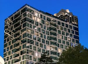 Renelle on the River Condominiums in Chicago at Blue Hour Renelle on the River at 403 North Wabash Avenue glows at blue hour along the Chicago River, with illuminated interiors and white spandrel panels forming a precise pattern across the glass facade. Designed by bKL Architecture for Belgravia Group, the 50-residence condominium tower brings a crisp contemporary profile to River North in Chicago, Illinois – © 2026 David Oppenheimer – Performance Impressions photography archives https://performanceimpressions.com Renelle on the River, Renelle on the River Chicago, Renelle condominiums, Renelle condos, Renelle Chicago, 403 North Wabash Avenue, 403 N Wabash Avenue, 403 N Wabash Ave, 403 N Wabash, North Wabash Avenue, Wabash Avenue, River North, River North Chicago, Near North Side, downtown Chicago, Chicago River, Chicago Riverwalk, Riverwalk, riverfront, Michigan Avenue, Magnificent Mile, Wrigley Building, Chicago, Chicago Illinois, Chicago IL, Illinois, 60611, facade, building exterior, exterior, tower exterior, glass facade, glass tower, curtain wall, glass curtain wall, vision glass, white spandrel glass, spandrel glass, reflective glass, aluminum facade, stone cladding, black granite, black granite base, illuminated facade, illuminated windows, building lights, window lights, facade lighting, geometric facade, facade pattern, window pattern, grid pattern, architectural pattern, reflections, blue hour, Chicago blue hour, twilight, dusk, evening, evening light, city lights, condominium tower, condo tower, residential tower, riverfront tower, luxury tower, residential building, condominium building, condominiums, condos, luxury condos, Chicago condos, River North condos, downtown condos, riverfront condos, high rise, high-rise, tower, building, contemporary tower, 18 story tower, 50 residences, three bedroom condos, four bedroom condos, floor-to-ceiling windows, balconies, luxury residences, urban living, multifamily, housing, real estate, Chicago real estate, River North real estate, condominium real estate, condo real estate, residential real estate, luxury real estate, riverfront real estate, architecture, architectural photography, Chicago architecture, contemporary architecture, modern architecture, residential architecture, high-rise architecture, riverfront architecture, bKL Architecture, bKL Architects, Belgravia Group, McHugh Construction, James McHugh Construction, Uzun and Case, Uzun+Case, SPACECO, dbHMS, post-tensioned concrete, reinforced concrete, LEED Silver, United States, licensing, image licensing, commercial imagery, photography licensing, art, print, fine art, commercial photography, David Oppenheimer, horizontal, 1-15213827141