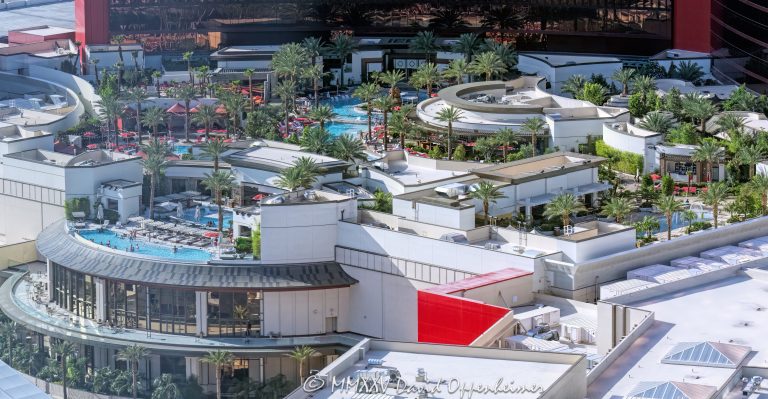 Resorts World Las Vegas pool complex on the Las Vegas Strip in Nevada aerial view — © 2025 David Oppenheimer — Performance Impressions travel photography archives — https://performanceimpressions.com Resorts World Las Vegas, Resorts World, Resorts World aerial, Resorts World Las Vegas aerial, Resorts World pool, Resorts World pool complex, Resorts World pool deck, Resorts World pool aerial, Resorts World pools, Las Vegas Strip, Las Vegas, Nevada, Las Vegas pools, Las Vegas pool complex, casino resort, luxury resort, luxury hotel, Hilton, Conrad Las Vegas, Crockfords Las Vegas, Hilton, Hilton Hotels, Hilton Las Vegas, Hilton Honors, Kamâdeo Beach, Wayfarer Dayclub, Athena, Athena Infinity Ultra Pool, Bimini Pool, cabanas, Cabana Pool, Family Pool, Main Pool, Zouk Nightclub, Agave, Agave Pool Bar, bars, Ayu Dayclub, poolside, cabanas, dayclub, nightlife, entertainment, resort design, architecture, modern architecture, contemporary architecture, skyline, tropical resort, desert, exterior, facade, swim, swimming, luxury resort, pool complex, pools, day club, dayclub, party, outdoors, resort photography, resort photographer, hospitality, real estate, commercial real estate, HTL, HTL stock, GENM, GENM stock, Genting Berhad, hotel photography, vacation, travel, tourism, pool party, pool scene, Strip aerial, aerial view, art, resort art, tropical, palm trees, 89109, United States, USA, horizontal, color, 1-14993092111