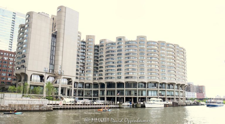 River City Apartments at 800 South Wells Street lines the Chicago River in the South Loop, with boats, kayakers, marina slips, and waterfront activity in the foreground. Designed by Bertrand Goldberg, the distinctive riverfront residential complex is known for its curved concrete form, mixed-use design, and housing along the South Branch of the Chicago River – © 2026 David Oppenheimer – Performance Impressions photography archives https://performanceimpressions.com River City Apartments, River City Chicago, River City Apartments Chicago, River City, 800 S Wells Street, 800 South Wells Street, 800 S Wells St, South Loop, South Loop Chicago, downtown Chicago, Chicago Illinois, Chicago IL, Chicago River, river, South Branch Chicago River, Chicago riverfront, riverfront, waterfront, Chicago waterfront, urban riverfront, riverfront apartments, waterfront apartments, riverfront real estate, waterfront real estate, Chicago real estate, South Loop real estate, residential real estate, real estate, marina, River City marina, boats, kayakers, kayaking, kayak, river boats, boat slips, waterway, 60607, facade, building exterior, exterior, residential facade, concrete facade, curved facade, concrete building, curved concrete, serpentine building, apartment building, apartment complex, residential building, residential complex, rental apartments, rentals, Chicago rentals, South Loop rentals, Chicago apartments, South Loop apartments, luxury apartments, apartment living, residential community, residential housing, housing, condos, condominiums, townhomes, penthouses, mixed use building, mixed use development, architecture, architectural photography, Chicago architecture, riverfront architecture, residential architecture, brutalist architecture, modern architecture, concrete architecture, Bertrand Goldberg, Bertrand Goldberg Associates, Marina City architect, Golub and Company, riverwalk, urban waterfront, urban living, recreation, outdoor recreation, Chicago boating, Chicago kayaking, Chicago skyline, Illinois architecture, United States, licensing, image licensing, commercial imagery, photography licensing, art, print, fine art, commercial photography, David Oppenheimer, horizontal, 1-15156784411