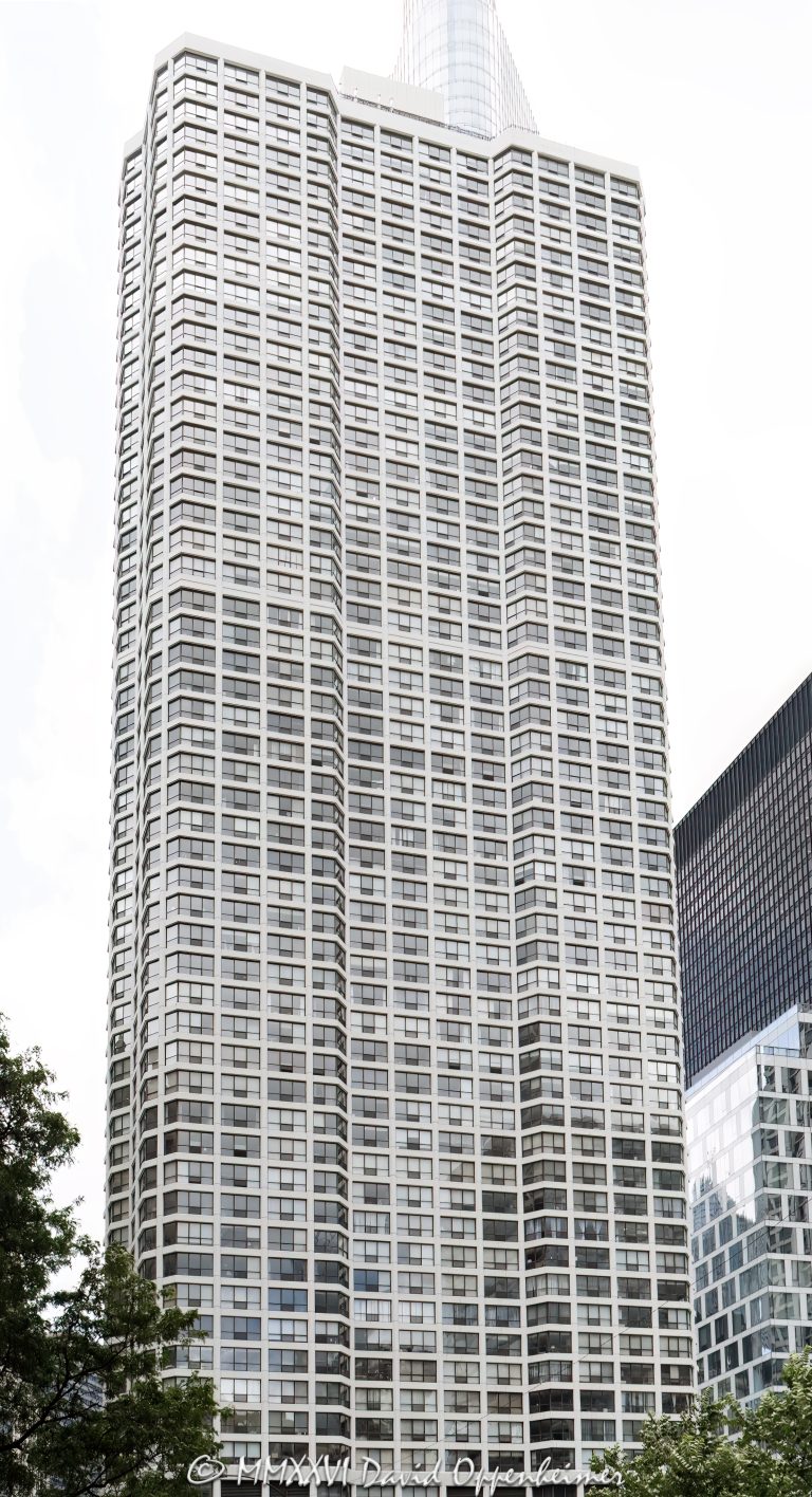 River Plaza at 405 North Wabash Avenue and Renelle on the River rise along the Chicago River in River North, showing a dense residential tower scene with glass facade, riverfront real estate, river traffic, and public art in view. River Plaza is a Gordon & Levin residential condominium tower, while nearby Renelle on the River is a bKL Architecture luxury condominium tower at 403 North Wabash Avenue – © 2026 David Oppenheimer – Performance Impressions photography archives https://performanceimpressions.com River Plaza, River Plaza Chicago, River Plaza condos, River Plaza condominiums, 405 N Wabash Ave, 405 North Wabash Avenue, 405 N Wabash, North Wabash Avenue, Wabash Avenue, Renelle on the River, Renelle Chicago, Renelle condos, Renelle condominiums, 403 N Wabash Ave, 403 North Wabash Avenue, River North, River North Chicago, downtown Chicago, Chicago Illinois, Chicago IL, Chicago River, river, riverfront, waterfront, Chicago riverfront, Chicago waterfront, Riverwalk, Chicago Riverwalk, 60611, facade, building exterior, exterior, glass facade, residential facade, tower, residential tower, condo tower, condominium tower, high rise, skyscraper, residential building, condo building, condominium building, luxury condos, luxury condominiums, condos, condominiums, real estate, Chicago real estate, River North real estate, residential real estate, riverfront real estate, waterfront real estate, housing, residential housing, riverboat, river boat, boat, boats, water, waterway, public art, sculpture, urban waterfront, urban living, city living, architecture, architectural photography, Chicago architecture, riverfront architecture, residential architecture, modern architecture, contemporary architecture, Gordon & Levin, Gordon and Levin, Ezra Gordon, Jack Levin, bKL Architecture, Belgravia Group, McHugh Construction, River Plaza Homeowners Association, Illinois architecture, United States, licensing, image licensing, commercial imagery, photography licensing, art, print, fine art, commercial photography, David Oppenheimer, vertical, 1-15156784411