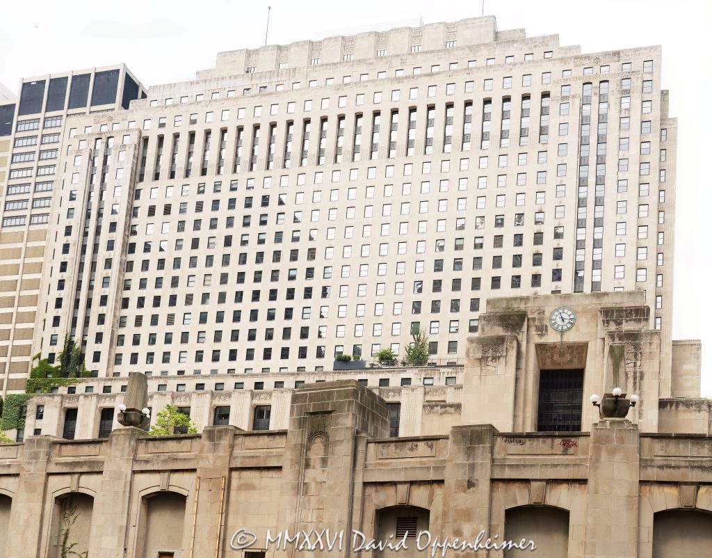 Riverside Plaza at 2 North Riverside Plaza in Chicago shows the Art Deco facade of the former Chicago Daily News Building, with limestone detailing, riverfront plaza architecture, and the Ogilvie Union water taxi area along the Chicago River. Designed by Holabird & Root for the Chicago Daily News, the historic office building remains one of Chicago’s best-known newspaper-era skyscrapers – © 2026 David Oppenheimer – Performance Impressions photography archives https://performanceimpressions.com Riverside Plaza, Riverside Plaza Chicago, 2 North Riverside Plaza, 2 N Riverside Plaza, 2 N Riverside Plz, Chicago Daily News Building, Chicago Daily News, Daily News Building, former Chicago Daily News Building, 400 W Madison Street, 400 West Madison Street, West Loop, West Loop Chicago, downtown Chicago, Chicago Illinois, Chicago IL, Chicago River, river, riverfront, waterfront, Chicago riverfront, Chicago waterfront, Ogilvie Union, Ogilvie Union ferry, Ogilvie Union water taxi, Chicago Water Taxi, water taxi, ferry terminal, boat dock, Madison Street Bridge, Canal Street, Washington Street, 60606, facade, building exterior, exterior, Art Deco, Art Deco facade, limestone facade, limestone, stone facade, sculpted facade, architectural detail, historic facade, office building, commercial building, newspaper building, newspaper headquarters, skyscraper, high rise, tower, plaza, public plaza, riverfront plaza, clock tower, clock towers, pylons, river pylons, architecture, architectural photography, Chicago architecture, Art Deco architecture, historic architecture, riverfront architecture, commercial architecture, Holabird & Root, Holabird and Root, Holabird & Roche, Holabird and Roche, Chicago Daily News developer, Walter A Strong, John W Norton, John Warner Norton, Printing the News, newspaper history, Chicago history, historic Chicago, Chicago journalism, Illinois architecture, United States, licensing, image licensing, commercial imagery, photography licensing, art, print, fine art, commercial photography, David Oppenheimer, horizontal, 1-15156784411