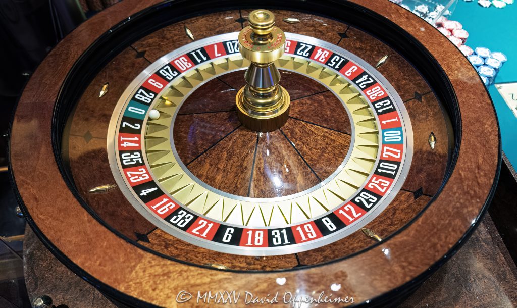 Roulette Wheel at Wynn Las Vegas Casino Roulette wheel at Wynn Las Vegas Resort and Casino in Las Vegas, Nevada - © 2025 David Oppenheimer - Performance Impressions casino photography archives - https://performanceimpressions.com Roulette table, Roulette, Wynn Casino, casino, Wynn roulette table, roulette wheel, chips, casino chips, gaming, play, betting, odds, win, gambling, wager, bet, luck, gamble, 3355 S Las Vegas Blvd, 89109, Wynn, Encore, Encore Las Vegas, Encore Resort, Encore Casino, Encore Vegas, Encore at Wynn, Wynn Las Vegas, Wynn Vegas, Wynn Resort, Wynn Resorts, 3131 Las Vegas Blvd S, 89109, hotel, resort, spin, building, architecture, shops, shopping, bridge, night, lights, city lights, WYNN, WYNN stock, five star, luxury, Las Vegas, Vegas, Las Vegas Strip, table game, casino floor, entertainment, luxury gaming, Nevada casino, vacation, escape, dream, fine art, artwork, luck, good luck, Nevada, Nevada photography, colorful, wall art, United States, vertical, color, 1-14993092111