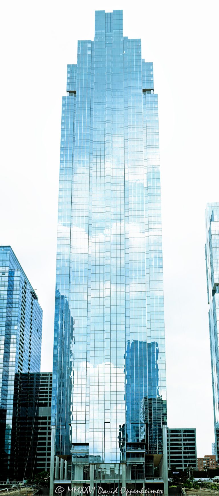 Salesforce Tower Chicago at 333 West Wolf Point Plaza rises above Chicago’s Wolf Point district, showing the tower’s curved glass facade and downtown office real estate presence. Designed by Pelli Clarke & Partners and developed by Hines with the Joseph P. Kennedy family, the office skyscraper was formerly known as Wolf Point South Tower and serves as Salesforce’s Chicago headquarters – © 2026 David Oppenheimer – Performance Impressions photography archives https://performanceimpressions.com Salesforce Tower Chicago, Salesforce Tower, Salesforce Chicago, Salesforce, Salesforce headquarters, Salesforce office, Salesforce building, Salesforce sign, 333 W Wolf Point Plaza, 333 West Wolf Point Plaza, 333 Wolf Point Plaza, Wolf Point South Tower, Wolf Point South, Wolf Point Chicago, Wolf Point, Wolf Point Plaza, River North, River North Chicago, Fulton River District, downtown Chicago, Chicago Illinois, Chicago IL, 60654, Chicago River, riverfront, Chicago riverfront, waterfront, Chicago waterfront, facade, building exterior, exterior, glass facade, curved glass, curved facade, reflective glass, building, tower, office tower, office building, commercial building, skyscraper, high rise, Class A office, trophy office, corporate office, corporate tower, real estate, Chicago real estate, commercial real estate, office real estate, riverfront real estate, waterfront real estate, business district, urban development, office development, architecture, architectural photography, Chicago architecture, contemporary architecture, commercial architecture, Pelli Clarke Pelli Architects, Pelli Clarke & Partners, Pelli Clarke and Partners, Hines, Hines Interests, Gerald D Hines Interests, Joseph P Kennedy family, Kennedy family, Wolf Point development, Wolf Point master plan, Salesforce Inc, CRM, technology company, cloud computing, software company, Chicago skyline, Illinois architecture, United States, licensing, image licensing, commercial imagery, photography licensing, art, print, fine art, commercial photography, David Oppenheimer, vertical, 1-15156784411