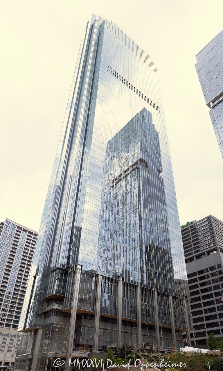 Salesforce Tower Chicago at 333 West Wolf Point Plaza rises above Chicago’s Wolf Point district, showing the tower’s curved glass facade and downtown office real estate presence. Designed by Pelli Clarke & Partners and developed by Hines with the Joseph P. Kennedy family, the office skyscraper was formerly known as Wolf Point South Tower and serves as Salesforce’s Chicago headquarters – © 2026 David Oppenheimer – Performance Impressions photography archives https://performanceimpressions.com Salesforce Tower Chicago, Salesforce Tower, Salesforce Chicago, Salesforce, Salesforce headquarters, Salesforce office, Salesforce building, Salesforce sign, 333 W Wolf Point Plaza, 333 West Wolf Point Plaza, 333 Wolf Point Plaza, Wolf Point South Tower, Wolf Point South, Wolf Point Chicago, Wolf Point, Wolf Point Plaza, River North, River North Chicago, Fulton River District, downtown Chicago, Chicago Illinois, Chicago IL, 60654, Chicago River, riverfront, Chicago riverfront, waterfront, Chicago waterfront, facade, building exterior, exterior, glass facade, curved glass, curved facade, reflective glass, building, tower, office tower, office building, commercial building, skyscraper, high rise, Class A office, trophy office, corporate office, corporate tower, real estate, Chicago real estate, commercial real estate, office real estate, riverfront real estate, waterfront real estate, business district, urban development, office development, architecture, architectural photography, Chicago architecture, contemporary architecture, commercial architecture, Pelli Clarke Pelli Architects, Pelli Clarke & Partners, Pelli Clarke and Partners, Hines, Hines Interests, Gerald D Hines Interests, Joseph P Kennedy family, Kennedy family, Wolf Point development, Wolf Point master plan, Salesforce Inc, CRM, technology company, cloud computing, software company, Chicago skyline, Illinois architecture, United States, licensing, image licensing, commercial imagery, photography licensing, art, print, fine art, commercial photography, David Oppenheimer, vertical, 1-15156784411