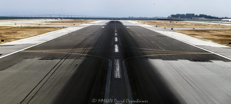 San Francisco International Airport runway 28R in San Francisco, California aerial view - © 2024 David Oppenheimer - Performance Impressions photography archives - https://performanceimpressions.com San Francisco International Airport, SFO, San Mateo County, San Francisco, Bay Area, airport, San Francisco Bay Area, KSFO, runway, tarmac, taxiing, aviation, landing, landing zone, rubber, tire marks, skid marks, 28R, California, takeoff, markings, touchdown zone, landing zone, threshold, aiming point, photography, David Oppenheimer, color, horizontal, United States, 1-13985601741,
