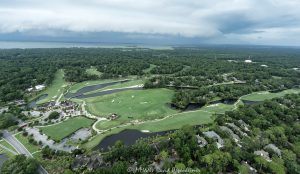 The Sea Pines Resort and Sea Pines Country Club Atlantic Dunes by Davis Love III golf course at 100 North Sea Pines Drive on Hilton Head Island, South Carolina with shelf cloud storm approaching aerial view - © 2024 David Oppenheimer - Performance Impressions photography archives - https://performanceimpressions.com The Sea Pines Resort, Atlantic Dunes by Davis Love III, Atlantic Dunes, Atlantic Dunes by Davis Love III aerial, Atlantic Dunes aerial, Davis Love III, 100 N Sea Pines Dr, Sea Pines Resort, Sea Pines golf course, Sea Pines, golf, golf courses, 72-par, 18 holes, seaside, seaside course, resort, hotel, clubhouse, vacation, oceanfront, ocean, beach, beachfront, Sea Pines Beach, seaside golf course, Hilton Head, Hilton Head Island, Town of Hilton Head, South Carolina, Lowcountry, Hilton head island real estate, Hilton Head real estate, Plantation Club Villas by Vacasa, Plantation Club, Fairway Lane Villas, Greenwood Garden, Greenwood Garden Villas, Fairway Oaks Villas, Fairway Oaks, Sea Pines Plantation, Briarwood, Swallowtail, Lawton Villas, Ocean Course Villas, Spicebush, Lighthouse Road Villas, Harbourwood, Twin Oaks, Sea Pines Center, Inland Harbor, Muirfield, Sea Loft, Heritage, Stoney Creek, Plantation Drive, Lighthouse Road, shelf cloud, cloud, storm cloud, weather, weather front, thunderstorm, real estate, Hilton Head aerial, aerial photographer, aerial photography, photography, aerial view, aerial, 29928, David Oppenheimer, David Gordon Oppenheimer, United States, color, horizontal, 1-13726821381,