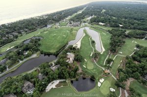 The Sea Pines Resort and Sea Pines Country Club Atlantic Dunes by Davis Love III golf course at 100 North Sea Pines Drive on Hilton Head Island, South Carolina, aerial view - © 2024 David Oppenheimer - Performance Impressions photography archives - https://performanceimpressions.com The Sea Pines Resort, Sea Pines Country Club, The Sea Pines Resort aerial, golf course, golf course aerial, oceanfront, Atlantic Dunes by Davis Love III, Atlantic Dunes, Atlantic Dunes golf course, Davis Love III, 100 N Sea Pines Dr, Sea Pines Resort, Sea Pines, golf, golf courses, 72-par, 18 holes, seaside, seaside course, Plantation Club Villas by Vacasa, Plantation Club, villas, homes, residences, vacation homes, Sea Pines Beach Club, beach club, resort, Woodbine Villas, Woodbine, Marriott's Monarch at Sea Pines, Turtle Lane Townhomes, Turtle Lane, Townhomes, Beach Lagoon Villas, beach, ocean, vacation, golfing, Hilton Head golf, Hilton Head Island golf, seaside, Hilton Head, Hilton Head Island, Town of Hilton Head, South Carolina, Lowcountry, Hilton head island real estate, Hilton Head real estate, real estate, Hilton Head aerial, aerial photographer, aerial photography, photography, aerial view, aerial, 29928, David Oppenheimer, David Gordon Oppenheimer, United States, color, horizontal, 1-13726821381,