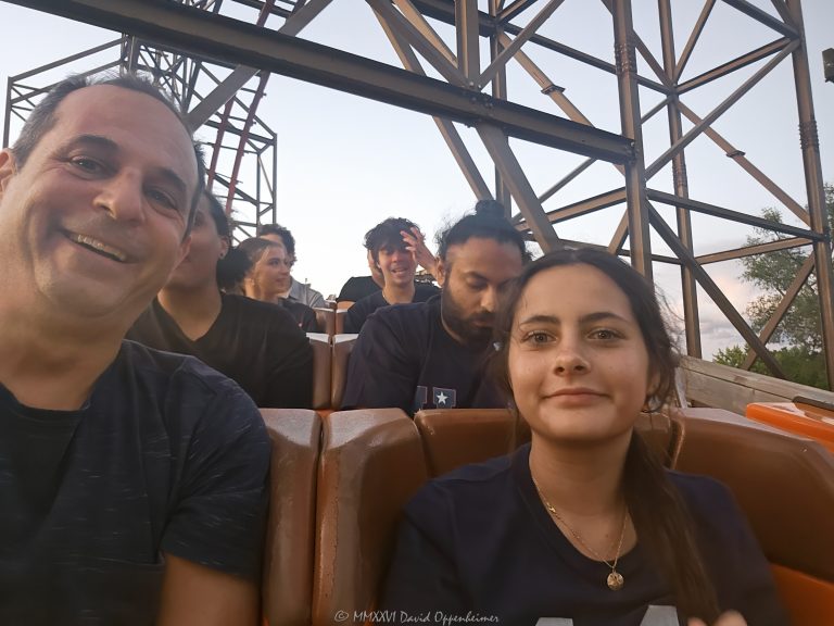 Goliath roller coaster at Six Flags Great America near Chicago in Gurnee, Illinois, with riders seen close up aboard the high-speed wooden coaster. The amusement park scene emphasizes the experience of riding one of Great America’s signature thrill rides in the County Fair section of the park – © 2026 David Oppenheimer – Performance Impressions photography archives https://performanceimpressions.com Goliath, Goliath roller coaster, Goliath Great America, Six Flags Goliath, Goliath coaster, Goliath ride, riding Goliath, Goliath riders, Goliath Chicago, Goliath Illinois, Six Flags Great America, Six Flags Great America Chicago, Great America Chicago, Great America Illinois, Six Flags Chicago, Six Flags Illinois, Six Flags, Great America, roller coaster, roller coasters, coaster, coasters, coaster ride, roller coaster ride, riding roller coaster, coaster riders, roller coaster riders, riders, rider, riding, ride, thrill ride, thrill rides, amusement ride, amusement rides, theme park ride, theme park rides, high-speed coaster, high speed, speed, adrenaline, thrill, thrills, excitement, action, wooden coaster, wooden roller coaster, wood coaster, RMC coaster, RMC, Rocky Mountain Construction, Rocky Mountain coaster, lift hill, first drop, steep drop, coaster drop, inversion, inversions, coaster train, roller coaster train, train, coaster car, roller coaster car, ride vehicle, restraints, County Fair, County Fair Six Flags, amusement park, theme park, amusement parks, theme parks, thrill park, roller coaster park, coaster park, amusement park visitor, theme park visitor, park visitors, visitors, visitor, people, family, family travel, family trip, family vacation, family attraction, family entertainment, family fun, amusement park vacation, theme park vacation, Six Flags vacation, Six Flags visit, Great America visit, summer, summer travel, summer vacation, vacation, travel, tourism, tourist, tourists, sightseeing, destination, travel destination, tourist attraction, attraction, attractions, Chicago attraction, Chicago attractions, Chicago tourism, Chicago travel, Chicago trip, Chicago vacation, Visit Chicago, visit Chicago, Chicago theme park, Chicago amusement park, Chicago area, Chicagoland, Chicago, Chicago Illinois, Gurnee, Gurnee Illinois, Gurnee IL, Illinois, Lake County, Lake County Illinois, northern Illinois, Illinois attraction, Illinois attractions, Illinois tourism, Illinois travel, Visit Illinois, Midwest, Midwest attraction, Midwest amusement park, Midwest theme park, Thrill Capital of the Midwest, Great America Parkway, 1 Great America Parkway, Grand Avenue, Route 132, Interstate 94, I-94, 60031, United States, USA, Six Flags Entertainment Corporation, Six Flags Entertainment, Six Flags company, NYSE FUN, FUN, Six Flags stock, Cedar Fair, Marriott’s Great America, Marriotts Great America, Marriott Great America, amusement park photography, theme park photography, roller coaster photography, coaster photography, action photography, travel photography, tourism photography, lifestyle photography, family travel photography, editorial photography, Six Flags photography, Great America photography, Goliath photography, amusement park art, theme park art, roller coaster art, Six Flags art, Great America art, roller coaster print, amusement park print, theme park print, Six Flags print, Great America print, photographic print, fine art print, archival print, gallery print, collector print, wall art, licensing, image licensing, commercial imagery, photography licensing, art, print, fine art, commercial photography, David Oppenheimer, Performance Impressions, Performance Impressions photography archives, horizontal, 1-15213827141