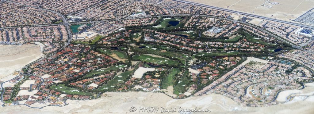 Southern Highlands Las Vegas Golf Community Aerial View Southern Highlands master-planned community and Southern Highlands Golf Club in Enterprise, Clark County, Nevada – featuring lush fairways, rolling greens, landscaped roads, gated neighborhoods, water features, and golf course terrain – aerial view – © 2025 David Oppenheimer – Performance Impressions aerial photography archives – https://performanceimpressions.com Southern Highlands, Southern Highlands Golf Club, master-planned community, gated community, luxury residential, championship, golf course, Las Vegas golf, Robert Trent Jones Sr., Robert Trent Jones Jr., Olympia Companies, Enterprise, Las Vegas Valley, Clark County, Nevada, homes, estates, fairways, greens, bunkers, water features, rolling terrain, landscaped roads, golfing, Vegas golf, golf community, residential development, private club, golf lifestyle, sports, recreation, outdoor sports, golfers, residences, residential, community layout, amenities, parks, tennis courts, walking paths, mountain views, desert setting, desert landscape, aerial, aerial view, horizontal, color, gated estates, real estate, neighborhood, green spaces, luxury homes, 1-14993092111