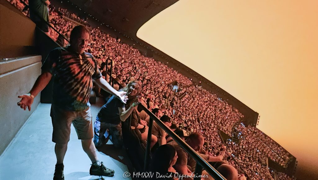 Crowd Inside Sphere Before Dead & Company Concert – Las Vegas Residency Sphere Las Vegas interior with seated crowd and massive screen before Dead & Company’s 2024 residency performance. The audience fills the venue in anticipation as the screen remains illuminated but without projected graphics, highlighting the scale and atmosphere of this unique concert experience – © 2025 David Oppenheimer – Performance Impressions travel photography archives – https://performanceimpressions.com Sphere, Sphere in Las Vegas, Las Vegas Sphere, MGM Sphere, Sphere at The Venetian, Las Vegas, Dead & Company, Grateful Dead, residency, concert, live music, audience, crowd, fans, people, seating, venue, arena, interior, inside, stage, screen, display, lights, lighting, Sphere Entertainment, Sphere Entertainment Group, Paradise, 255 Sands Ave, 89169, Nevada, marketing, advertising, entertainment, media, MSG Networks, MSG, architecture, facility, performance, event, show, United States, horizontal, color, 1-14993092111