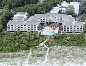 The Breakers Hilton Head oceanfront villas at 4 N Forest Dr on Hilton Head Island, South Carolina aerial view - © 2024 David Oppenheimer - Performance Impressions aerial photography archives - https://performanceimpressions.com The Breakers Hilton Head, The Breakers, 4 North Forest Dr, The Breakers Villas, villas, Coligny Plaza, Breakers Vacation Rentals, pool, building, architecture, villas, condos, apartments, furnished, beach, beach access, coast, South Carolina coast, coastal, shoreline, shore, shoreline aerial, waterfront, dunes, sand, beachfront, sand dunes, resort, vacation, vacation homes, beach houses, houses, beach homes, summer, summer homes, residences, properties, Atlantic Ocean, Hilton Head, Hilton Head Island, Town of Hilton Head, South Carolina, coastline, luxury, Lowcountry, Hilton head island real estate, Hilton Head real estate, real estate, Hilton Head aerial, aerial photographer, aerial photography, photography, aerial view, aerial, 29928, David Oppenheimer, David Gordon Oppenheimer, United States, color, horizontal, 1-13726821381,