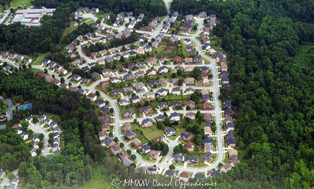 The Enclave at Princeton Lakes in Atlanta Aerial View The Enclave at Princeton Lakes in Atlanta, Georgia residential gated community of single family homes and the North Fork Camp Creek running through wooded green space aerial view – © 2025 David Oppenheimer – Performance Impressions aerial photography archives – https://performanceimpressions.com The Enclave, The Enclave at Princeton Lakes, The Communities at Princeton Lakes, Princeton Lakes, Atlanta, Georgia, Fulton County, gated community, residential, neighborhood, community, subdivision, single family homes, homes, residences, housing, real estate, planned community, master-planned, estates, development, cul-de-sac, curved streets, quiet streets, rooftops, driveways, lawns, yards, landscaping, green space, trees, wooded, forested, urban forest, parkland, trail, walking paths, sidewalks, recreation, Camp Creek, North Fork Camp Creek, creek, stream, waterway, wetlands, retention pond, stormwater, pond, suburban, suburban Atlanta, southwest Atlanta, Camp Creek Parkway, Camp Creek Marketplace, airport area, Hartsfield-Jackson, Atlanta neighborhood, Georgia neighborhood, real estate development, zoning, land use, property layout, aerial, aerial view, aerial photography, residential aerial, subdivision aerial, neighborhood aerial, horizontal, color, daylight, sunny, summer, photographer, Performance Impressions, real estate photography, United States, USA, US, horizontal, 1-14993092111