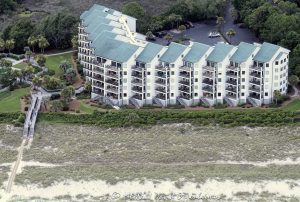 The Sea Cloisters on Hilton Head vacation rentals at 50 Starfish Dr on Hilton Head Island, South Carolina aerial view - © 2024 David Oppenheimer - Performance Impressions aerial photography archives - https://performanceimpressions.com The Sea Cloisters on Hilton Head, Sea Cloisters, 50 Starfish Dr, villas, Folly Field Beach, pool, building, architecture, villas, condos, apartments, furnished, beach, Bradley Beach, Folly Field Beach Park, beach access, coast, South Carolina coast, coastal, shoreline, shore, shoreline aerial, waterfront, dunes, sand, beachfront, sand dunes, resort, vacation, vacation homes, beach houses, houses, beach homes, summer, summer homes, residences, properties, Atlantic Ocean, Hilton Head, Hilton Head Island, Town of Hilton Head, South Carolina, coastline, luxury, Lowcountry, Hilton head island real estate, Hilton Head real estate, real estate, Hilton Head aerial, aerial photographer, aerial photography, photography, aerial view, aerial, 29928, David Oppenheimer, David Gordon Oppenheimer, United States, color, horizontal, 1-13726821381,