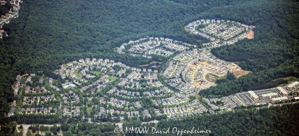The Village at Tributary Douglasville Georgia Aerial View Tributary Village master planned community of single family homes in Douglasville, Georgia aerial view – © 2025 David Oppenheimer – Performance Impressions aerial photography archives – https://performanceimpressions.com Tributary, Tributary Village, Douglasville, The Village, The Village community, The Village Atlanta, The Village neighborhood, Atlanta, 30122, Georgia, Fulton County, residential, neighborhood, housing, community, subdivision, planned community, single family homes, houses, rooftops, cul de sac, driveways, streets, tree lined, landscaping, lawns, green space, trees, wooded, urban forest, residential development, homes, housing, Atlanta community, Atlanta neighborhood, real estate, aerial, aerial view, color, horizontal, United States, 1-14993092111