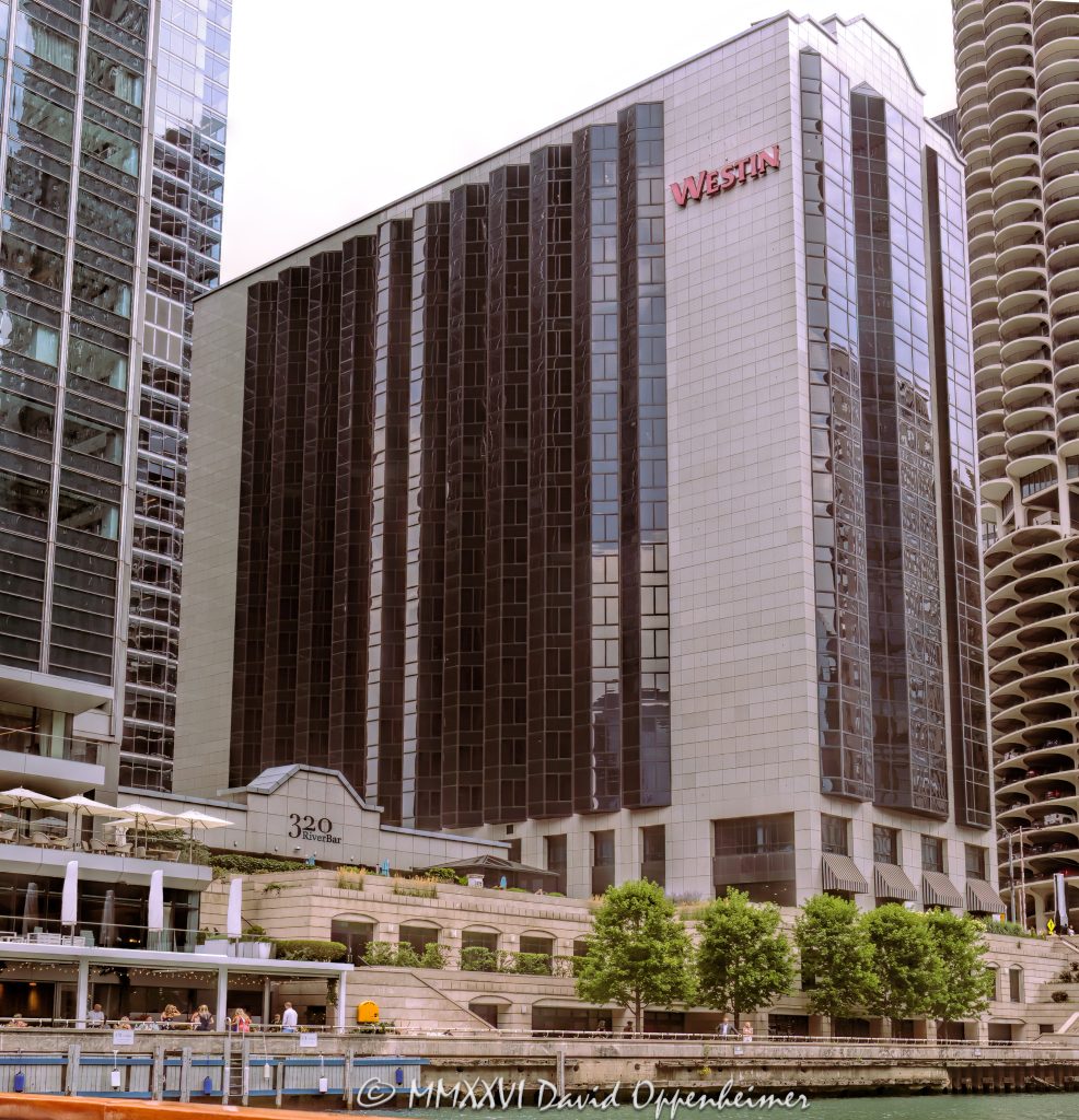 The Westin Chicago River North at 320 North Dearborn Street stands along the Chicago River in the River North business district, showing the hotel’s riverfront facade and downtown hospitality setting. Operated under Marriott International’s Westin brand, the former Hotel Nikko Chicago includes 320 RiverBar and is positioned for business travel, meetings, dining, and riverfront hotel stays – © 2026 David Oppenheimer – Performance Impressions photography archives https://performanceimpressions.com The Westin Chicago River North, Westin Chicago River North, Westin River North, Westin River North Chicago, The Westin River North Chicago, 320 N Dearborn Street, 320 North Dearborn Street, 320 N Dearborn St, North Dearborn Street, Dearborn Street, Hotel Nikko Chicago, former Hotel Nikko, Hotel Nikko, Marriott, Marriott International, Marriott Bonvoy, Westin, Westin Hotels, Westin brand, 320 RiverBar, 320 River Bar, RiverBar, Kamehachi, River North, River North Chicago, downtown Chicago, Chicago Illinois, Chicago IL, 60654, Chicago River, river, riverfront, waterfront, water, Chicago riverfront, Chicago waterfront, Riverwalk, Chicago Riverwalk, riverfront hotel, waterfront hotel, Chicago River hotel, downtown hotel, Chicago hotel, business hotel, convention hotel, meeting hotel, hotel, hotels, hospitality, travel, tourism, business travel, facade, building exterior, exterior, hotel facade, glass facade, modern facade, tower, hotel tower, high rise, commercial building, real estate, Chicago real estate, hotel real estate, riverfront real estate, waterfront real estate, architecture, architectural photography, Chicago architecture, riverfront architecture, commercial architecture, postmodern architecture, Host Hotels, Host Hotels & Resorts, 320 Restaurant, dining, restaurant, bar, river view, river views, Illinois architecture, United States, licensing, image licensing, commercial imagery, photography licensing, art, print, fine art, commercial photography, David Oppenheimer, vertical, 1-15156784411