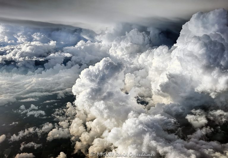 Flying by a Cumulonimbus supercell storm cloud with an anvil at altitude - © 2024 David Oppenheimer - Performance Impressions photography archives - https://performanceimpressions.com supercell, supercell storm cloud, Cumulonimbus, anvil, altitude, jet, plane, aerial, aerial view, wall cloud, storm, meteorology, weather, stormy, thunderstorm, cloud, precipitation, David Oppenheimer, summer, summer storm clouds, horizontal, cloud formations, severe weather, wall cloud, Mesocyclone, ceiling, stratospheric cirrus, stratosphere, formation, anvil cloud, high-altitude, extreme weather, Mammatus clouds, Mammatus, overshooting top, atmosphere, color, aerial, aerial view, aerial photography, aerial photographer, United States, 1-13985601741,