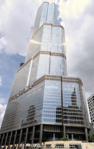 Trump International Hotel and Tower Chicago Trump International Hotel and Tower Chicago at 401 North Wabash Avenue rises in River North, showing the glass and stainless-steel facade of the mixed-use hotel and condominium skyscraper. Designed by Skidmore, Owings & Merrill with Adrian Smith as lead architect and structural engineering by William F. Baker, the tower includes hotel rooms, condominiums, retail space, and parking – © 2026 David Oppenheimer – Performance Impressions photography archives https://performanceimpressions.com Trump International Hotel and Tower Chicago, Trump International Hotel & Tower Chicago, Trump International Hotel and Tower, Trump International Hotel & Tower, Trump Tower Chicago, Trump Tower, Trump Chicago, 401 N Wabash Avenue, 401 North Wabash Avenue, 401 N Wabash Ave, 401 N Wabash, North Wabash Avenue, Wabash Avenue, River North, River North Chicago, Near North Side, downtown Chicago, Chicago Illinois, Chicago IL, 60611, Chicago River, Chicago riverfront, facade, building exterior, exterior, hotel facade, glass facade, stainless steel facade, stainless steel, reflective glass, glass tower, Trump sign, building, tower, hotel tower, condo tower, condominium tower, residential tower, skyscraper, supertall, high rise, mixed use tower, mixed use building, condo hotel, hotel, luxury hotel, five star hotel, condominiums, condos, luxury condos, luxury residences, residences, real estate, Chicago real estate, luxury real estate, hotel real estate, residential real estate, commercial real estate, architecture, architectural photography, Chicago architecture, contemporary architecture, hotel architecture, residential architecture, commercial architecture, Skidmore Owings Merrill, Skidmore Owings & Merrill, SOM, Adrian Smith, William F Baker, William F. Baker, Donald Trump, President Trump, Trump Organization, Bovis Lend Lease, Illinois architecture, United States, licensing, image licensing, commercial imagery, photography licensing, art, print, fine art, commercial photography, David Oppenheimer, vertical, 1-15156784411