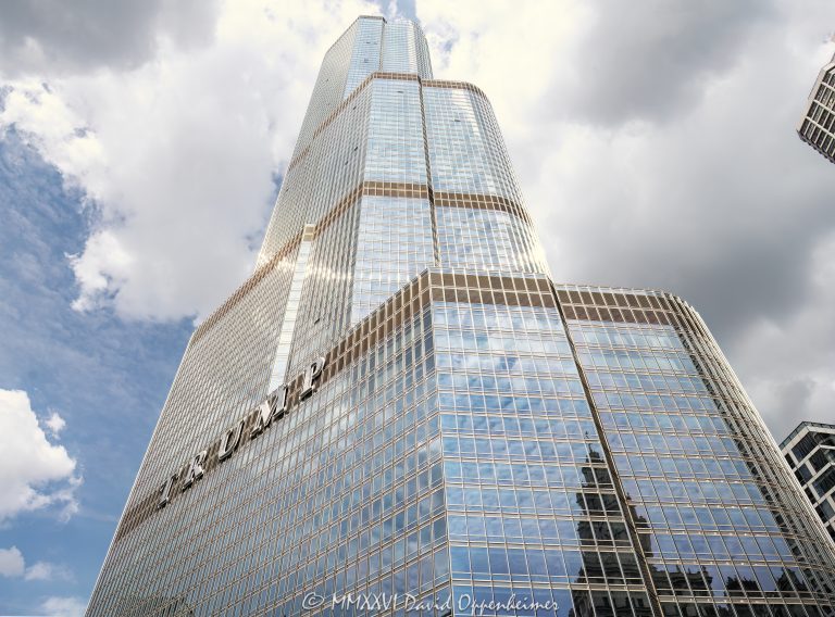 Trump International Hotel and Tower Chicago at 401 North Wabash Avenue rises in River North, showing the glass and stainless-steel facade of the mixed-use hotel and condominium skyscraper. Designed by Skidmore, Owings & Merrill with Adrian Smith as lead architect and structural engineering by William F. Baker, the tower includes hotel rooms, condominiums, retail space, and parking – © 2026 David Oppenheimer – Performance Impressions photography archives https://performanceimpressions.com Trump International Hotel and Tower Chicago, Trump International Hotel & Tower Chicago, Trump International Hotel and Tower, Trump International Hotel & Tower, Trump Tower Chicago, Trump Tower, Trump Chicago, 401 N Wabash Avenue, 401 North Wabash Avenue, 401 N Wabash Ave, 401 N Wabash, North Wabash Avenue, Wabash Avenue, River North, River North Chicago, Near North Side, downtown Chicago, Chicago Illinois, Chicago IL, 60611, Chicago River, Chicago riverfront, facade, building exterior, exterior, hotel facade, glass facade, stainless steel facade, stainless steel, reflective glass, glass tower, Trump sign, building, tower, hotel tower, condo tower, condominium tower, residential tower, skyscraper, supertall, high rise, mixed use tower, mixed use building, condo hotel, hotel, luxury hotel, five star hotel, condominiums, condos, luxury condos, luxury residences, residences, real estate, Chicago real estate, luxury real estate, hotel real estate, residential real estate, commercial real estate, architecture, architectural photography, Chicago architecture, contemporary architecture, hotel architecture, residential architecture, commercial architecture, Skidmore Owings Merrill, Skidmore Owings & Merrill, SOM, Adrian Smith, William F Baker, William F. Baker, Donald Trump, President Trump, Trump Organization, Bovis Lend Lease, Illinois architecture, United States, licensing, image licensing, commercial imagery, photography licensing, art, print, fine art, commercial photography, David Oppenheimer, horizontal, 1-15156784411