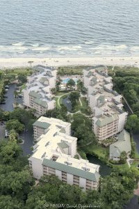 Villamare Resort at Palmetto Dunes villas at 1 Ocean Lane on Hilton Head Island, South Carolina aerial view - © 2024 David Oppenheimer - Performance Impressions aerial photography archives - https://performanceimpressions.com Villamare, Villamare Hilton Head, Villamare Villas, Villamare Resort, Palmetto Dunes, 1 Ocean Lane, vacation rentals, ocean, villas, pool, building, architecture, villas, condos, apartments, furnished, beach, oceanfront, beach access, coast, South Carolina coast, coastal, shoreline, shore, shoreline aerial, waterfront, dunes, sand, beachfront, sand dunes, resort, vacation, vacation homes, beach houses, beach homes, summer, summer homes, residences, properties, Atlantic Ocean, Hilton Head, Hilton Head Island, Town of Hilton Head, coastline, luxury, Lowcountry, Hilton head island real estate, Hilton Head real estate, real estate, Hilton Head aerial, aerial photographer, aerial photography, photography, aerial view, aerial, 29928, David Oppenheimer, David Gordon Oppenheimer, United States, color, vertical, 1-13726821381,